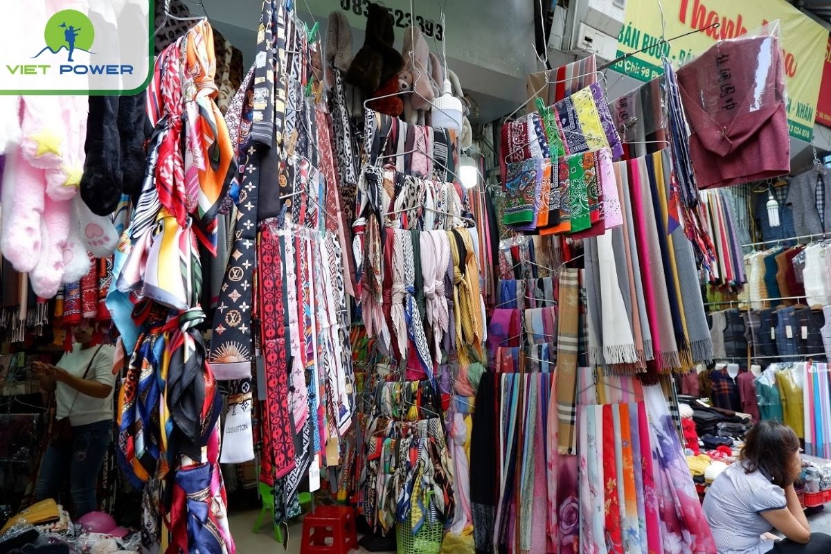 Shopping silk scarves on Hang Gai street