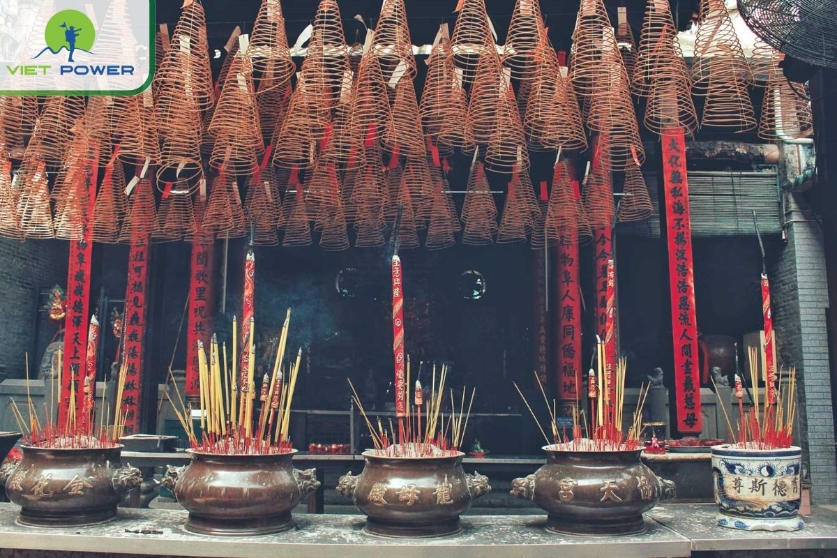 Incense coil system hanging from the ceiling of Thien Hau Temple