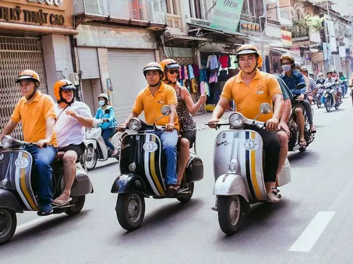 Saigon After Dark: Vespa Bites & Neon Lights with Streets & Eats