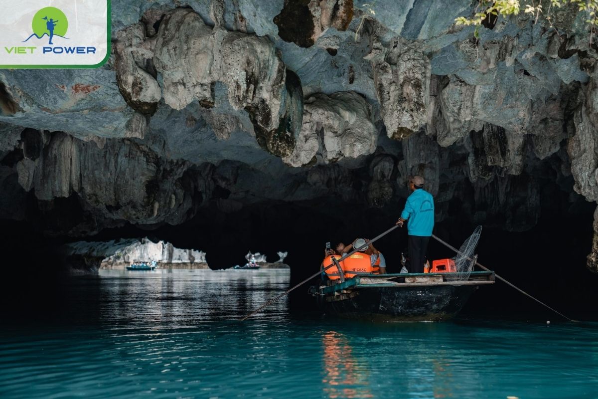 Explore Dark and Bright Cave by bamboo boat